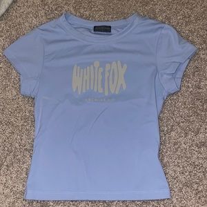 light blue white fox top with bubble lettering